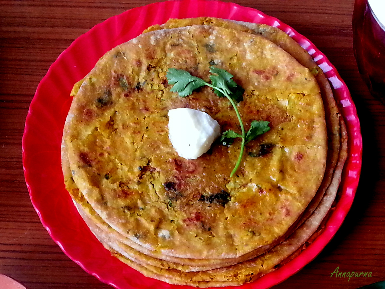 Onion paratha with curd/ pickle