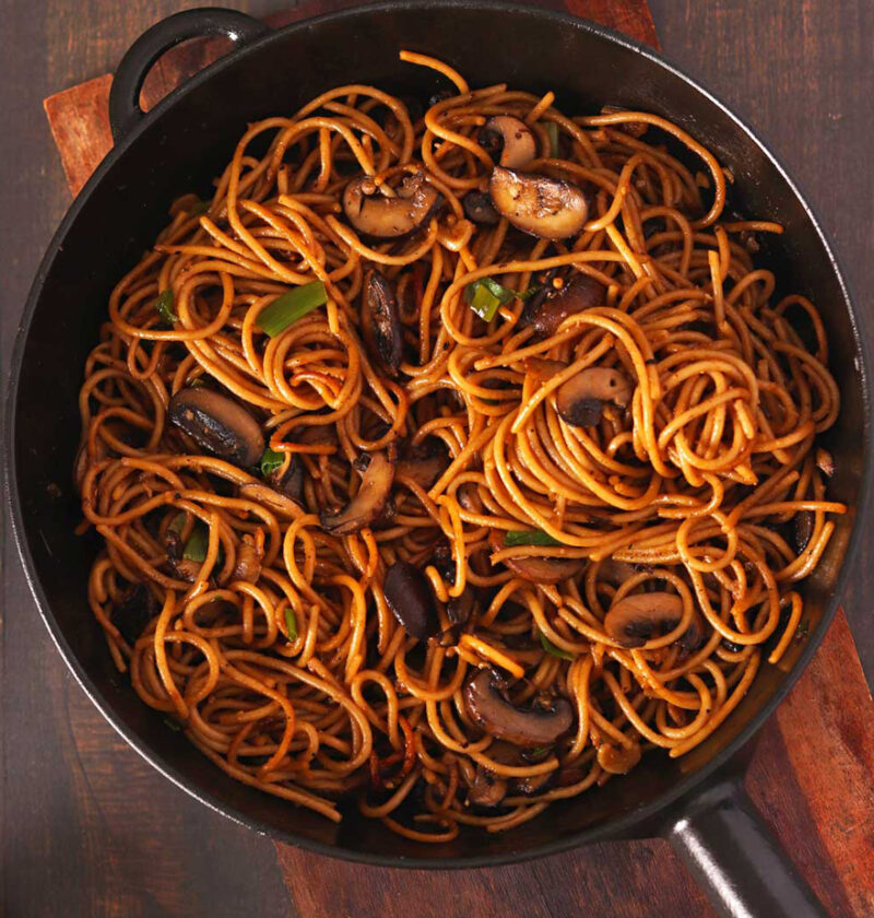 Schezwan Mushroom Fried Noodles