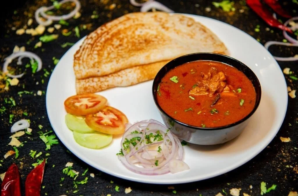 Kal Dosai with Chicken Kolambu