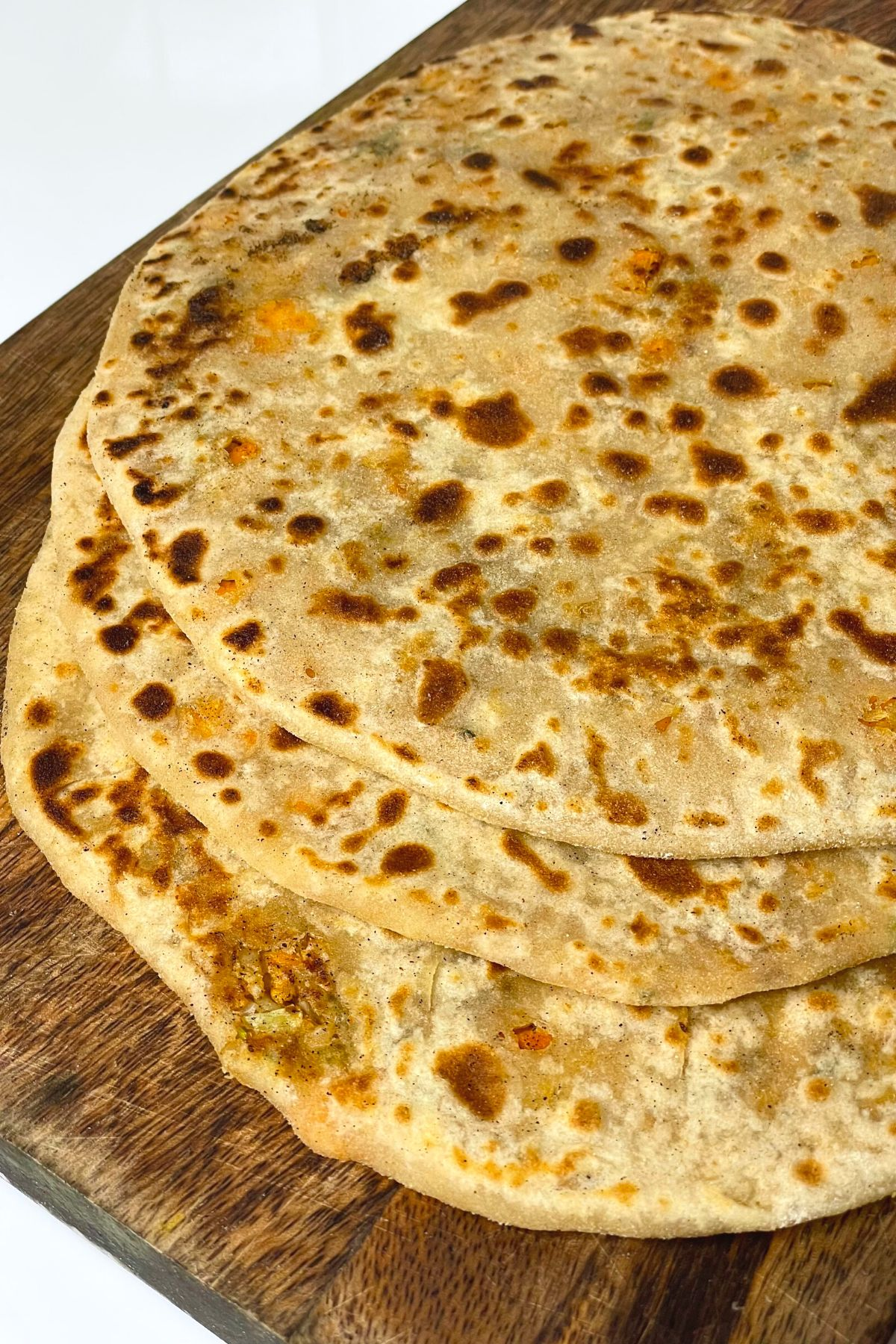 Cauliflower Paratha with Amul butter, Fresh curd, Sweet & Sour Chutney and Mint Chutney/ Garlic Chutney