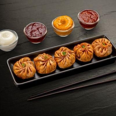 Fried Veg Schezwan Momos (5 Pcs)