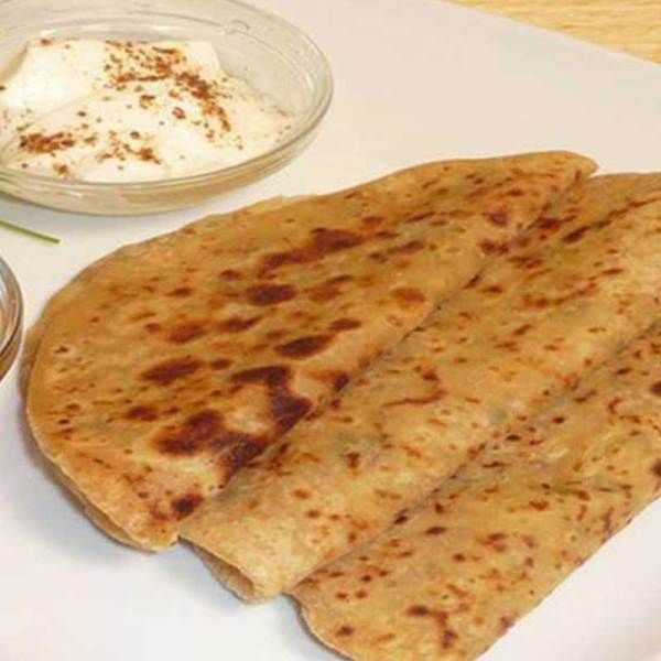 Masala Paratha with Amul butter, Fresh curd, Sweet & Sour Chutney and Mint Chutney/ Garlic Chutney