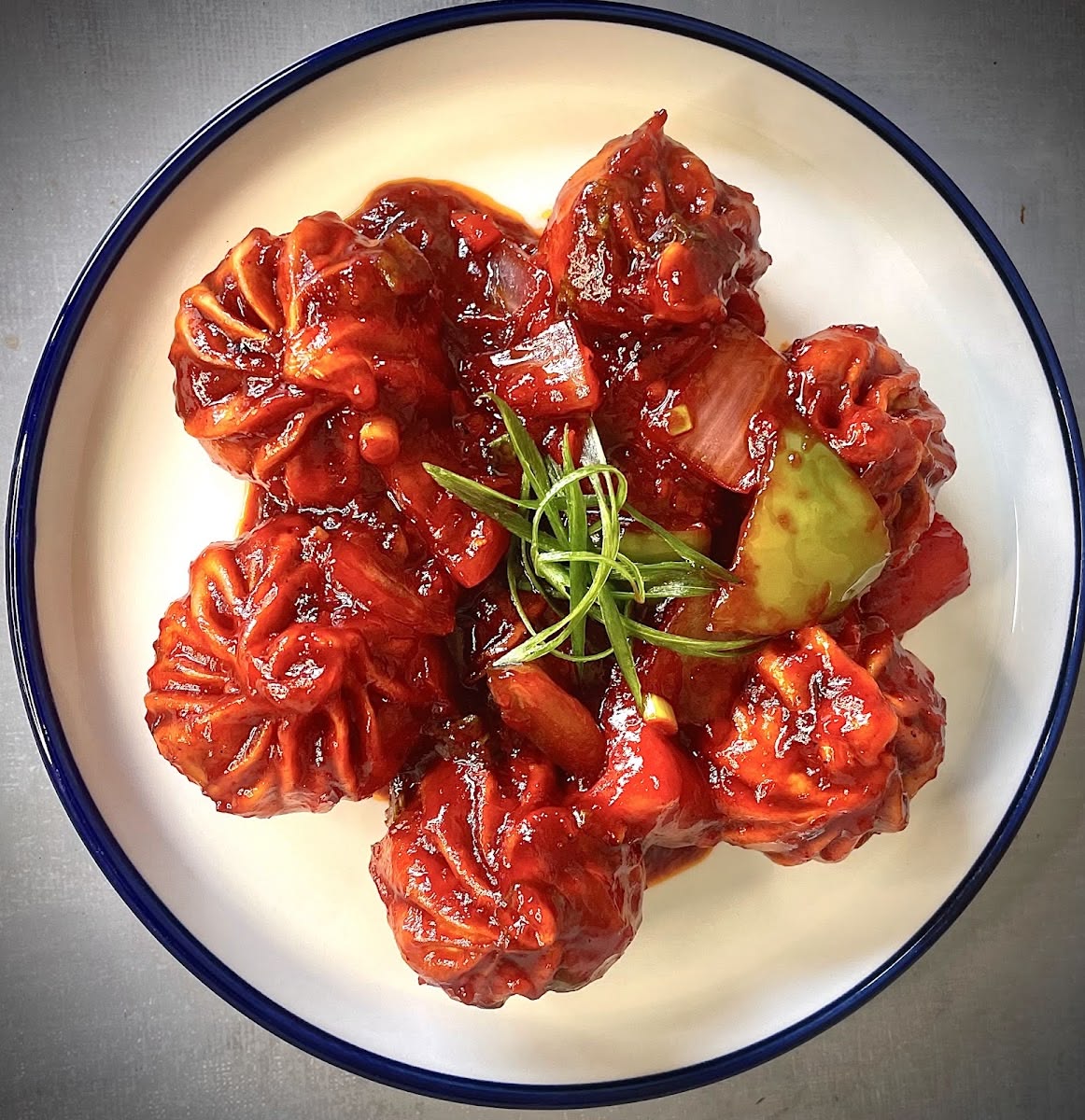 Fried Schezwan Chicken Momos (5 Pcs)