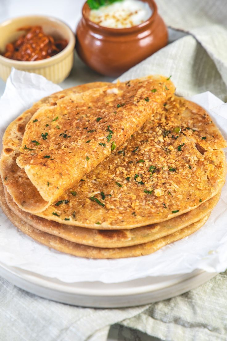 Paneer Paratha with Amul butter, Fresh curd, Sweet & Sour Chutney and Mint Chutney/ Garlic Chutney