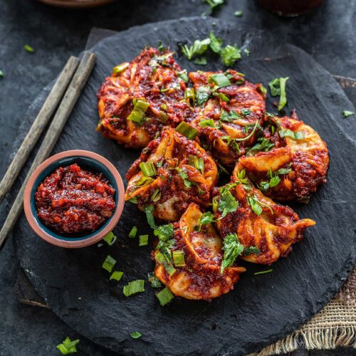 Chicken Schezwan Momos - Steamed